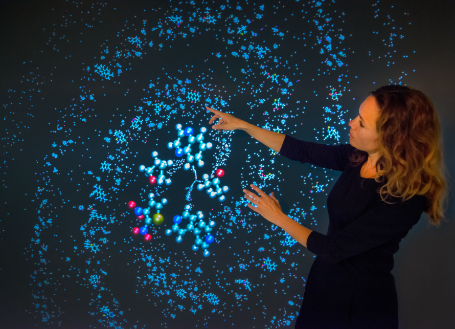 Kristen Persson points at a electrolyte genome 3D visualization